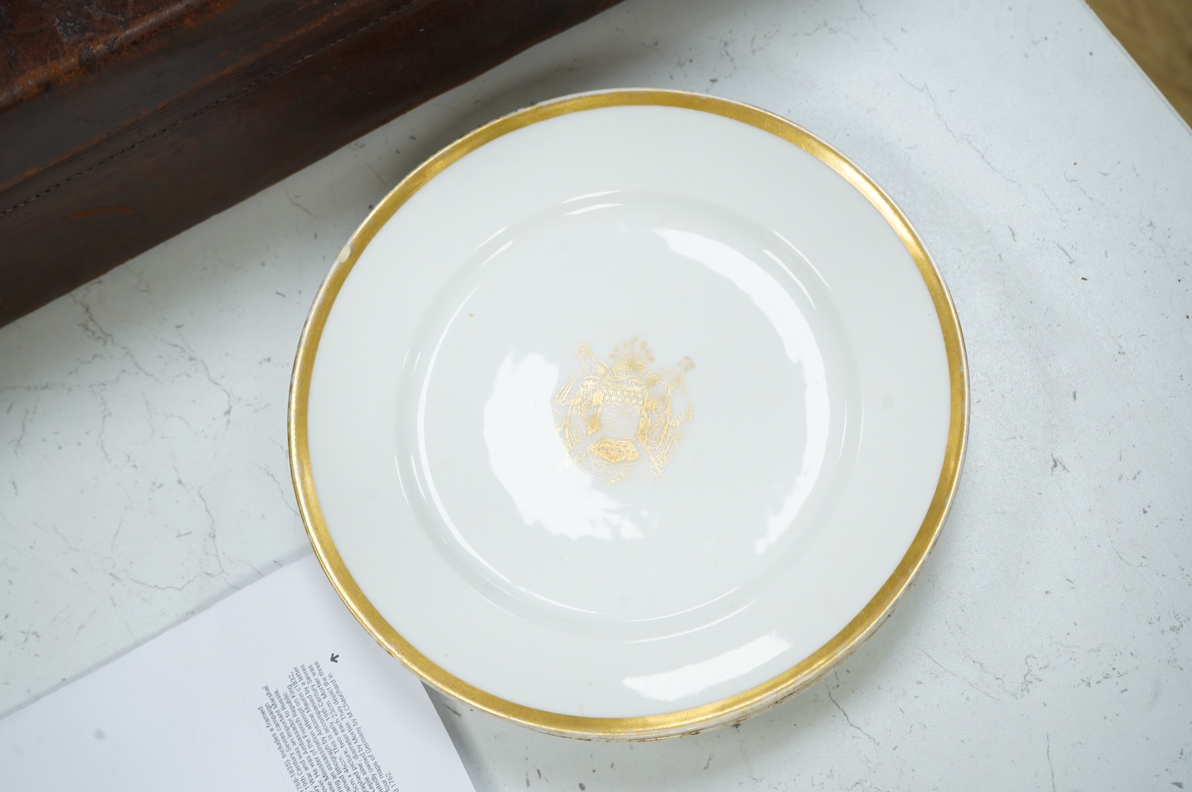 Two late 19th century Sevres campaign plates from a dining set owned by Marshall Edouard Mortier, Duke of Trevise, and later Prime Minister of France, together with a related letter dated 1928 from a descendant mentionin